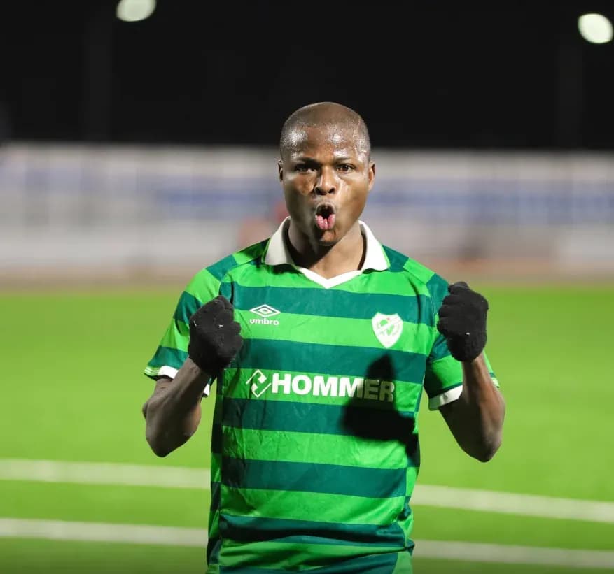 Kloukpo celebrating with clenched fists