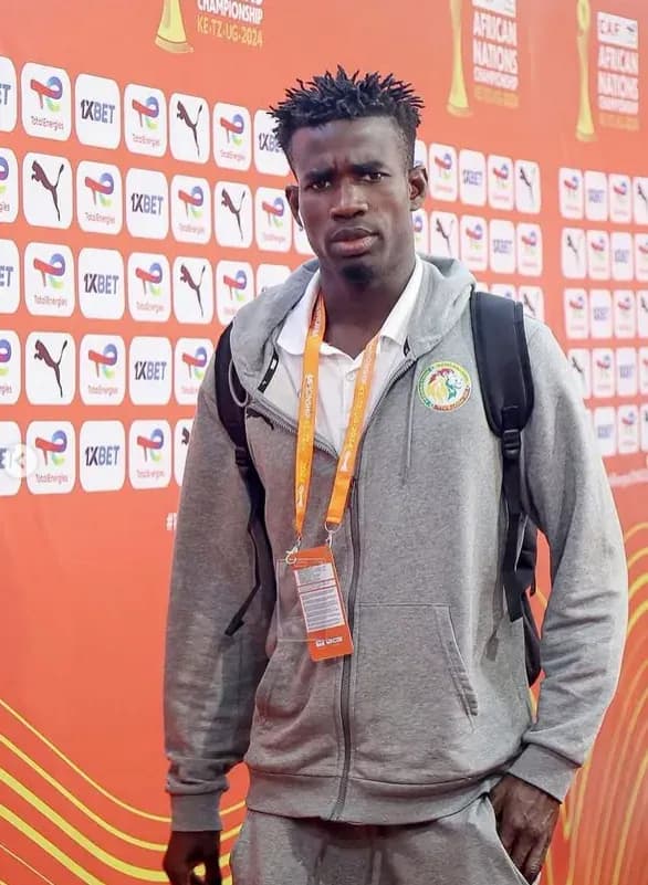 Mbaye Yaya Ly at a tournament media wall