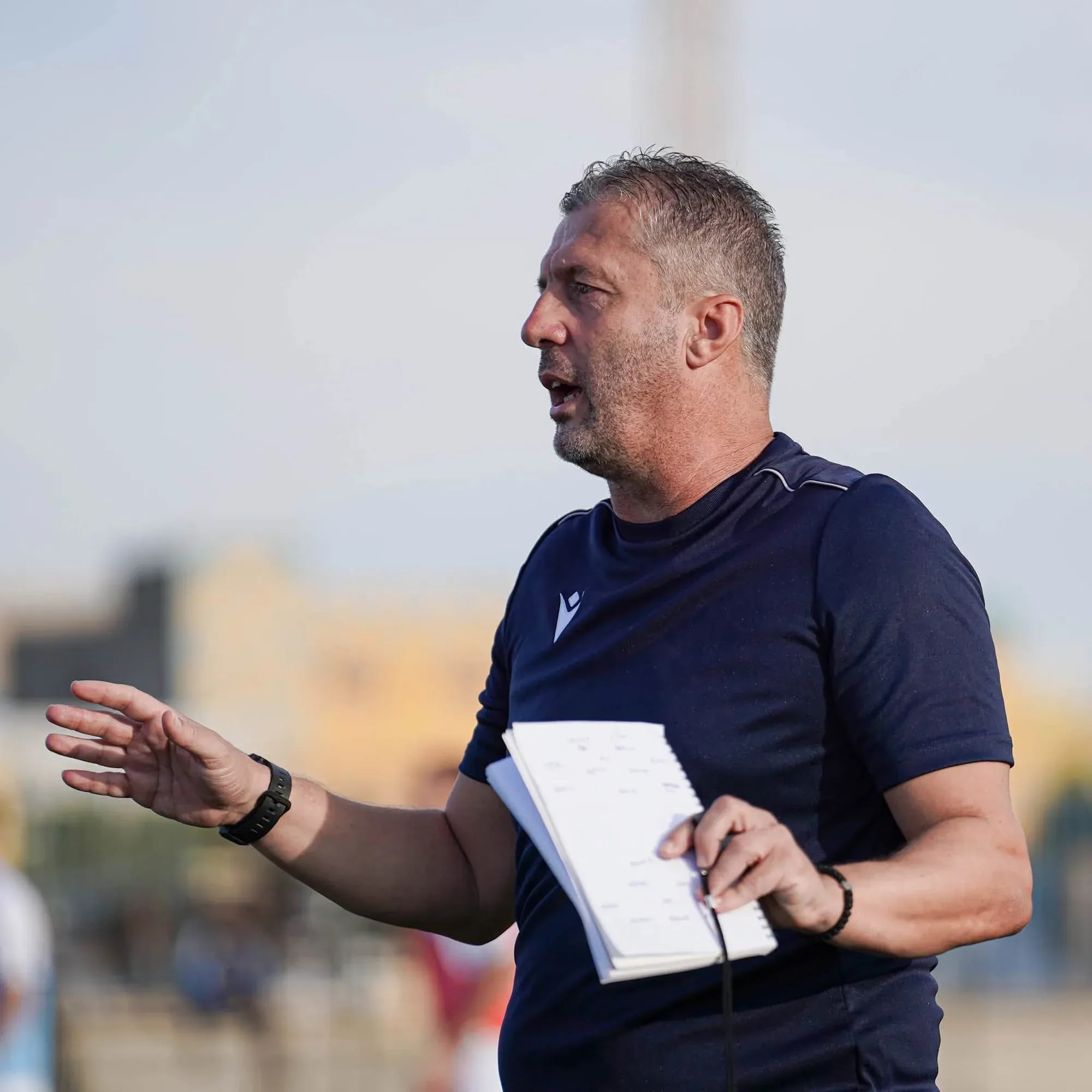 Miljan Radovic giving instructions from the touchline